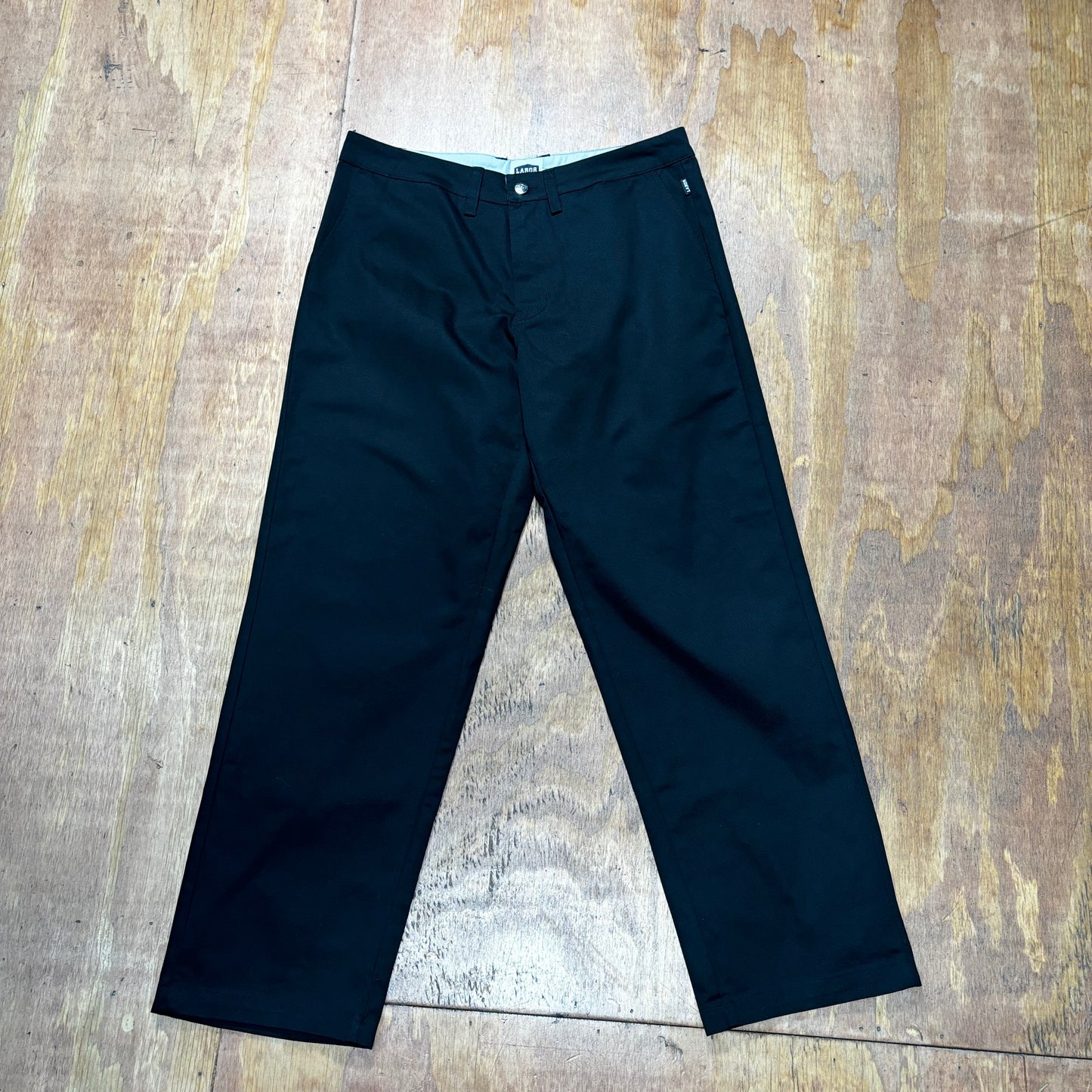 front view of black cotton chino pant