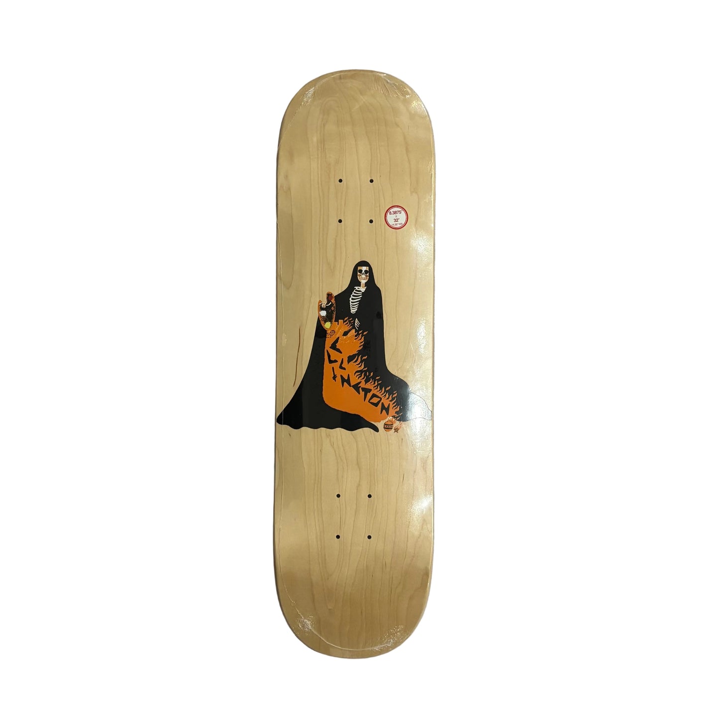 woodgrain color skateboard deck with a black and orange skeleton like graphic printed in the middle of the deck, against a white background