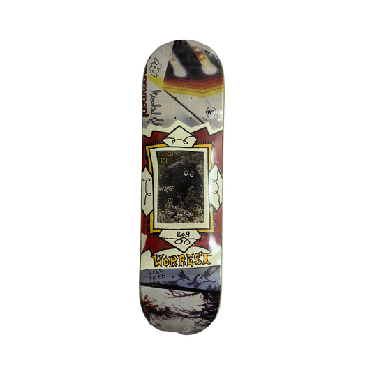 Collage style krooked skateboard deck with WORREST in center of deck with photo of bigfoot like creature with krooked eyes over the face on a white background
