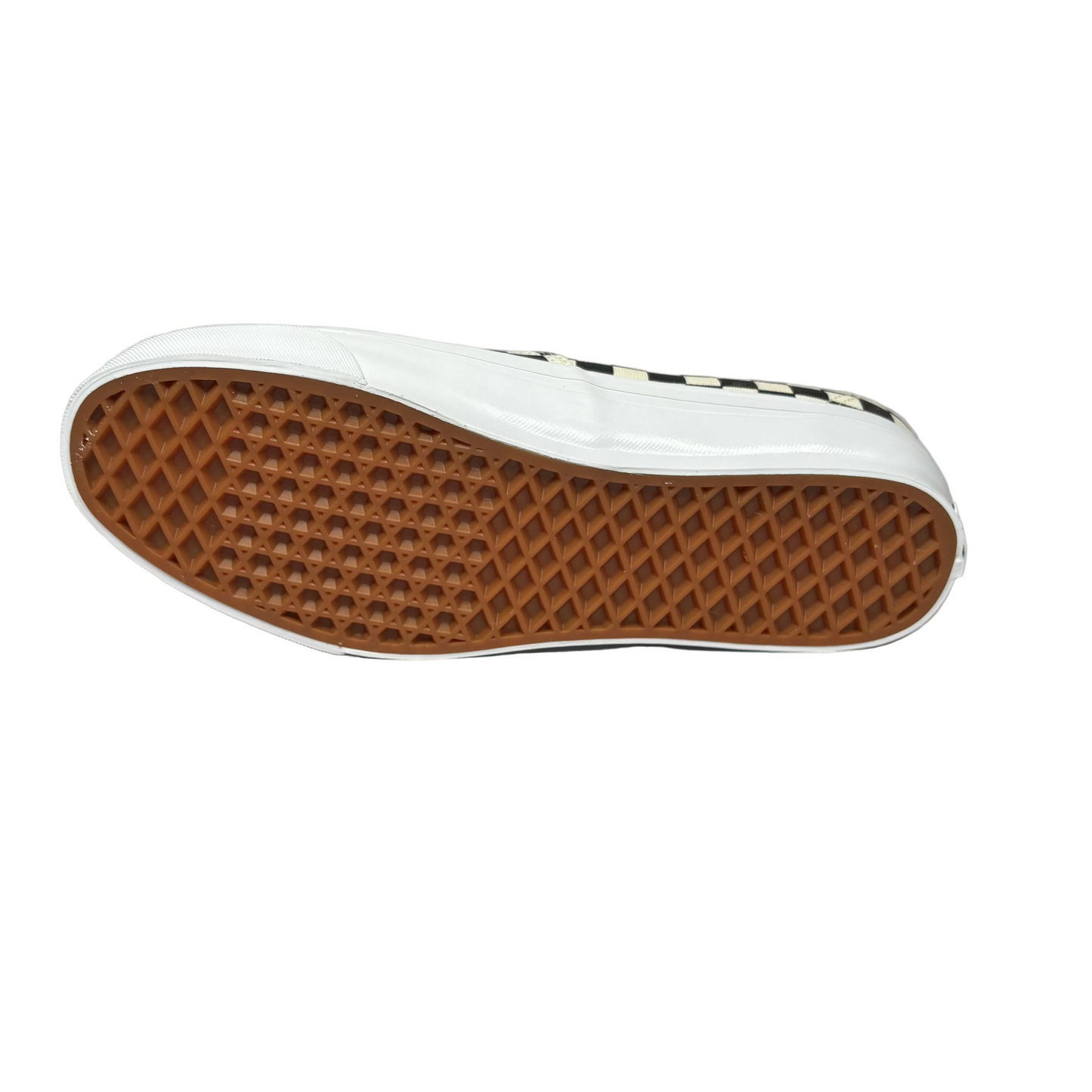 view of brown gum rubber sole of vans deck shoe, on a white background