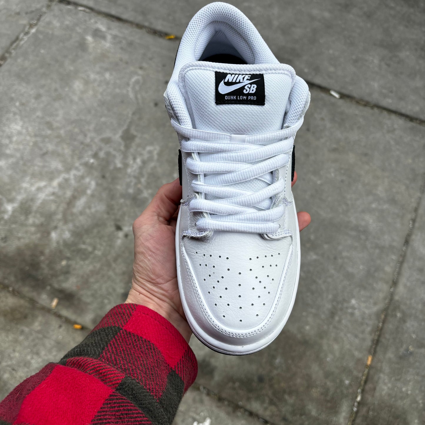 Top down view of Nike SB white/black dunk low