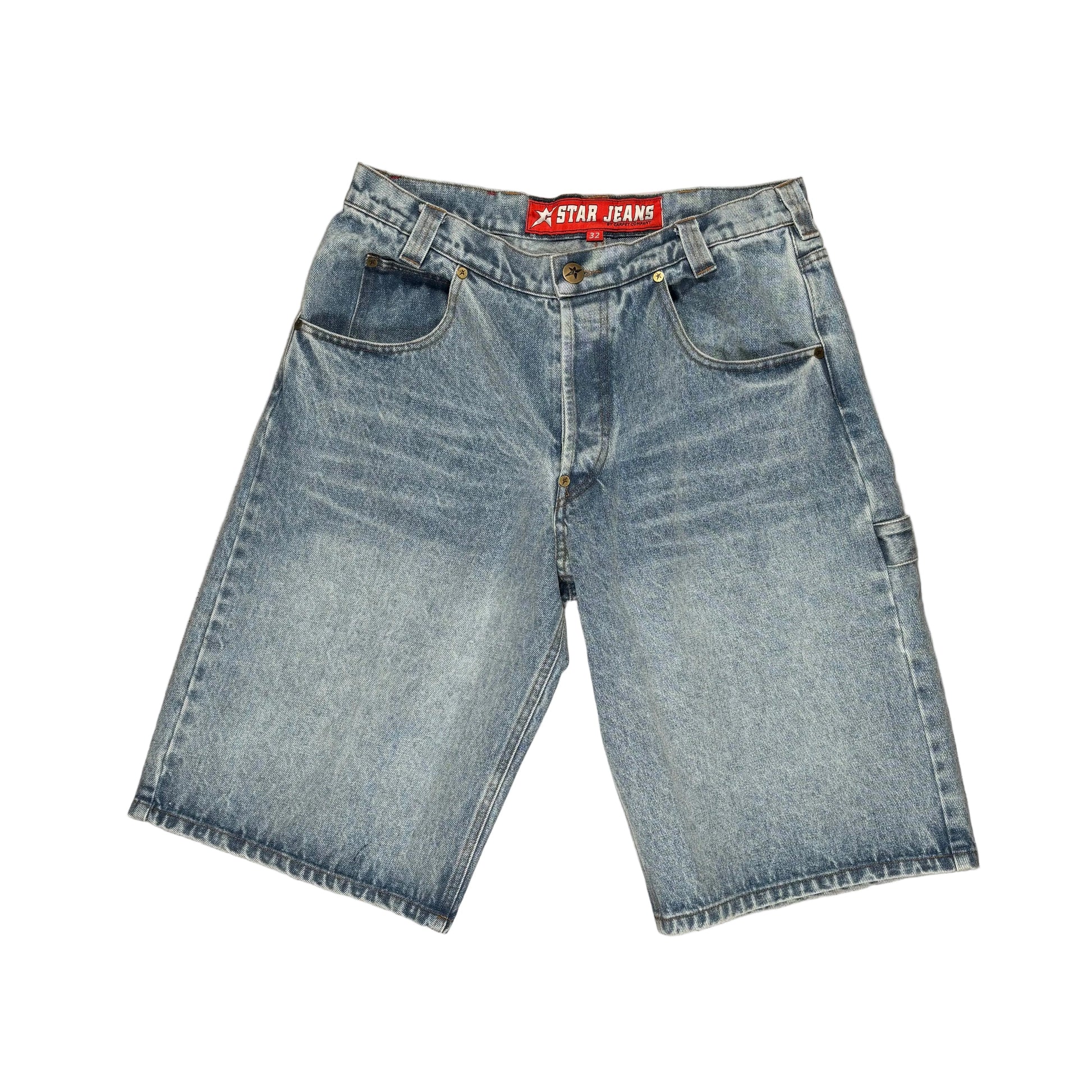 Light blue denim shorts with a faded wash, laid flat on a textured light gray sheet. The brand label 'C-STAR JEANS' is visible at the waistband.