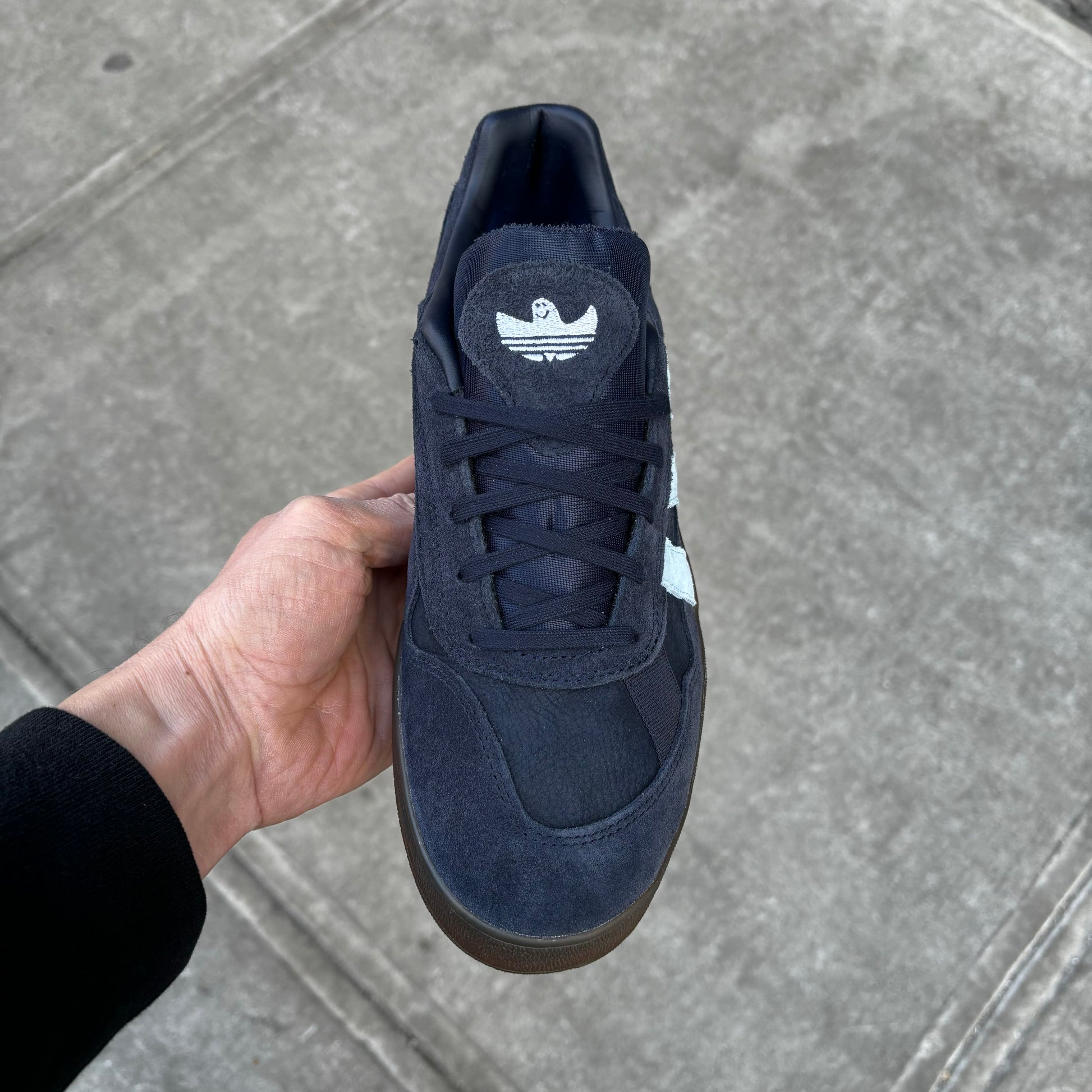 top down view of navy suede skateboard sneaker