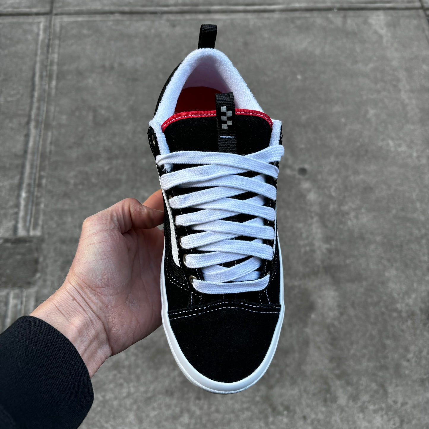 top down view of black suede and mesh skateboard sneaker