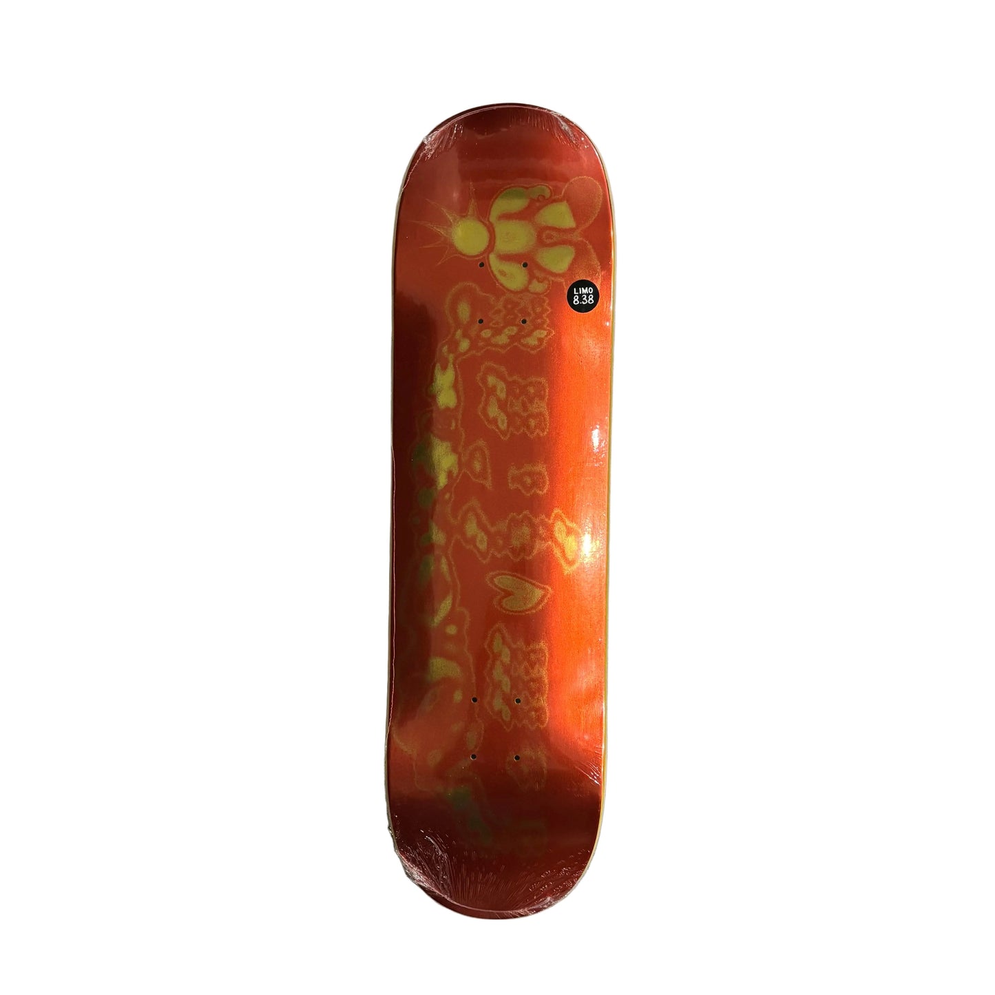 A skateboard deck with a vibrant orange and red flame graphic and yellow accents, on a white background