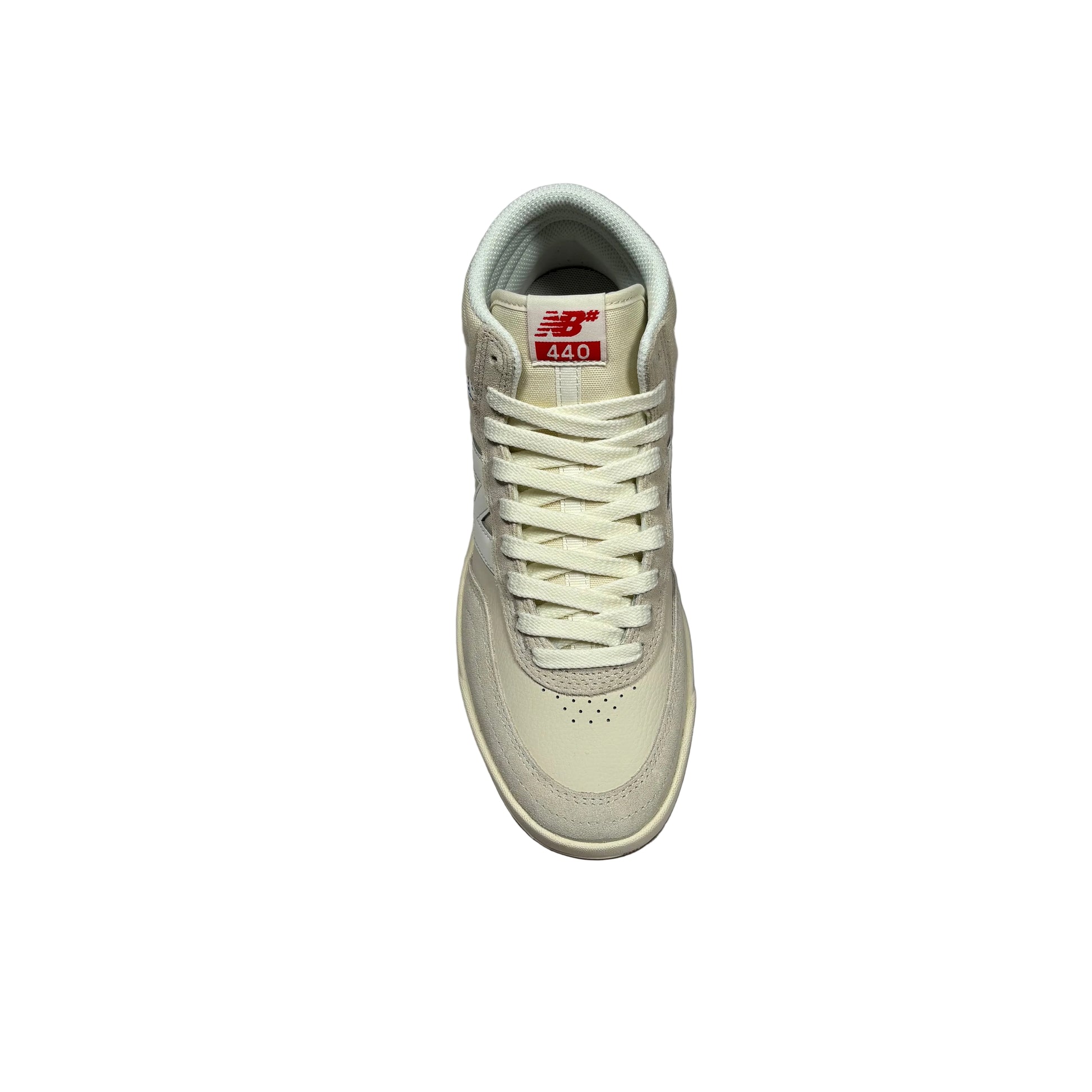 A single New Balance 440 high-top sneaker in off-white/cream with a red and white tongue label, photographed from a top-down angle on a white background.