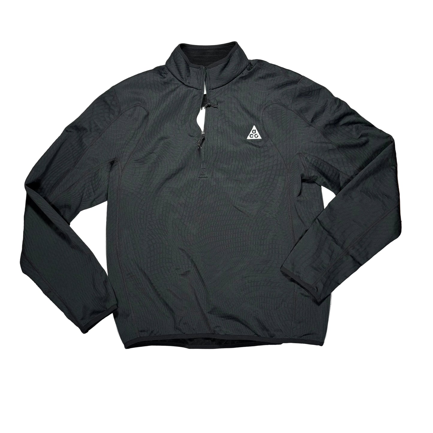 A black long-sleeve quarter-zip pullover laid flat on a white surface, with a small white geometric triangle ACG logo on the left chest.