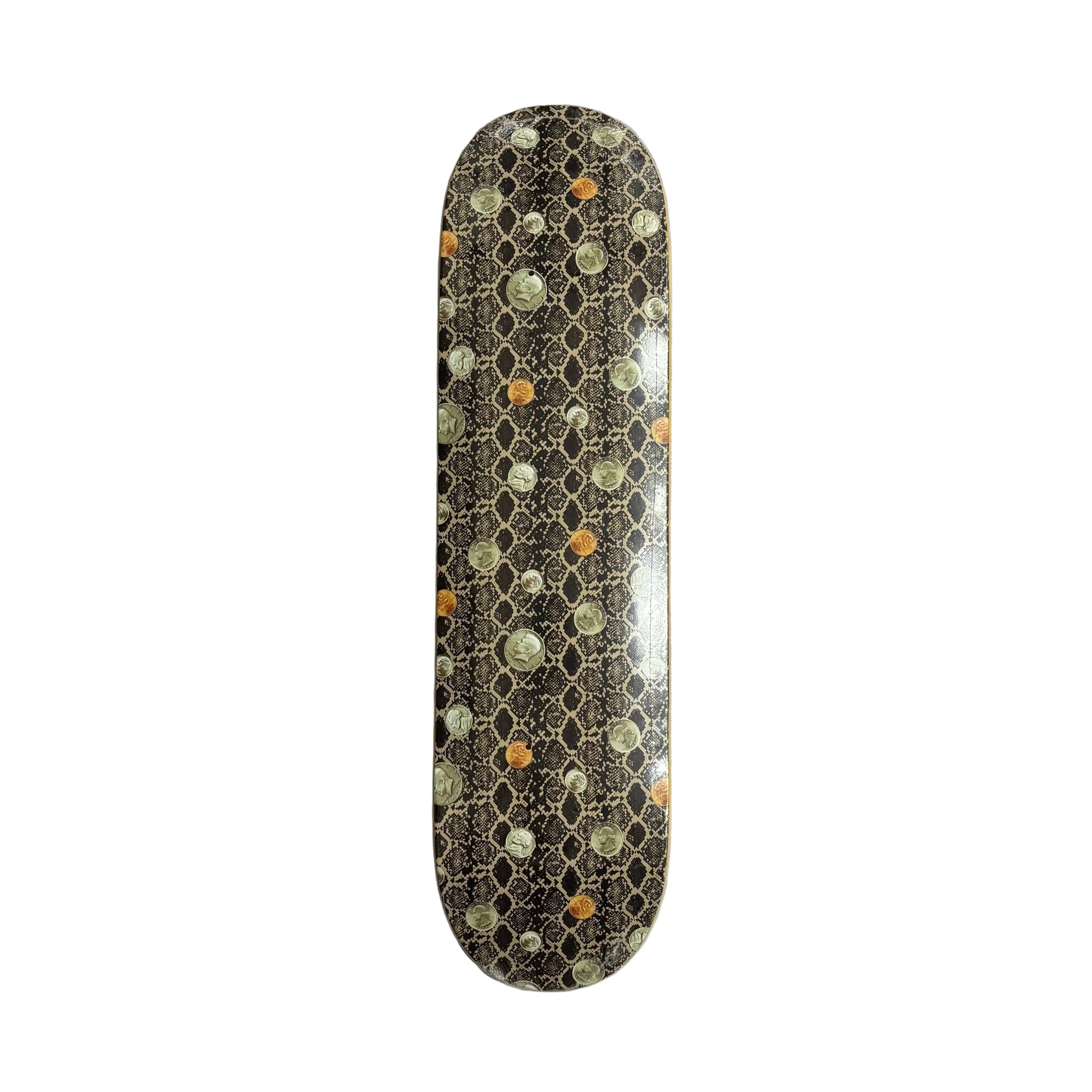 A skateboard deck with a dark brown and black honeycomb pattern with coins, and colorful circular spots in orange, green, and white, resting on a white background