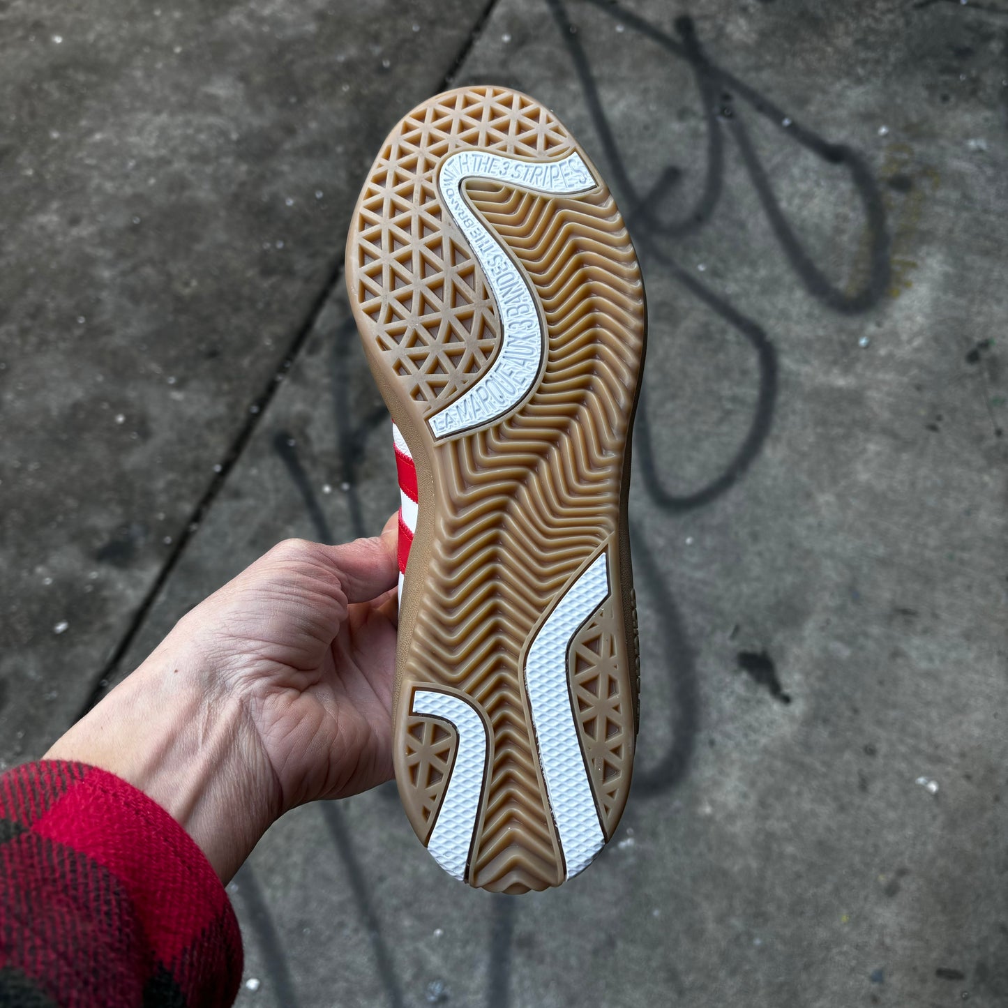 view of gum rubber outsole on skateboard sneaker