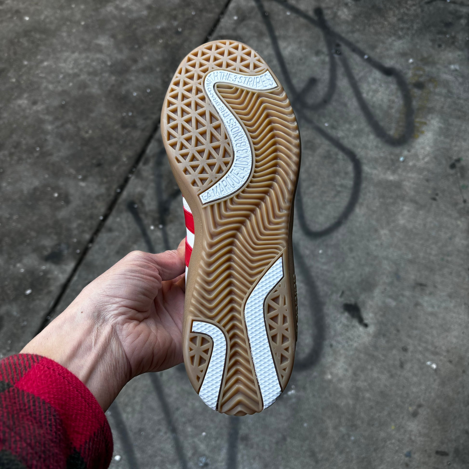 view of gum rubber outsole on skateboard sneaker