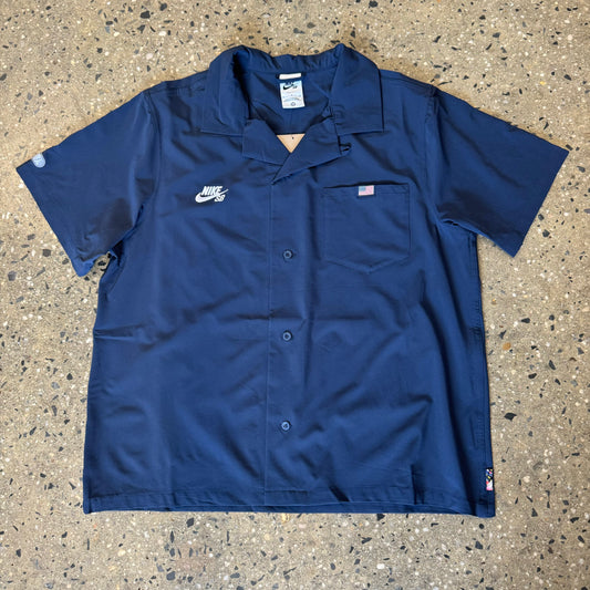 navy blue bowling style button up shirt with nike logo