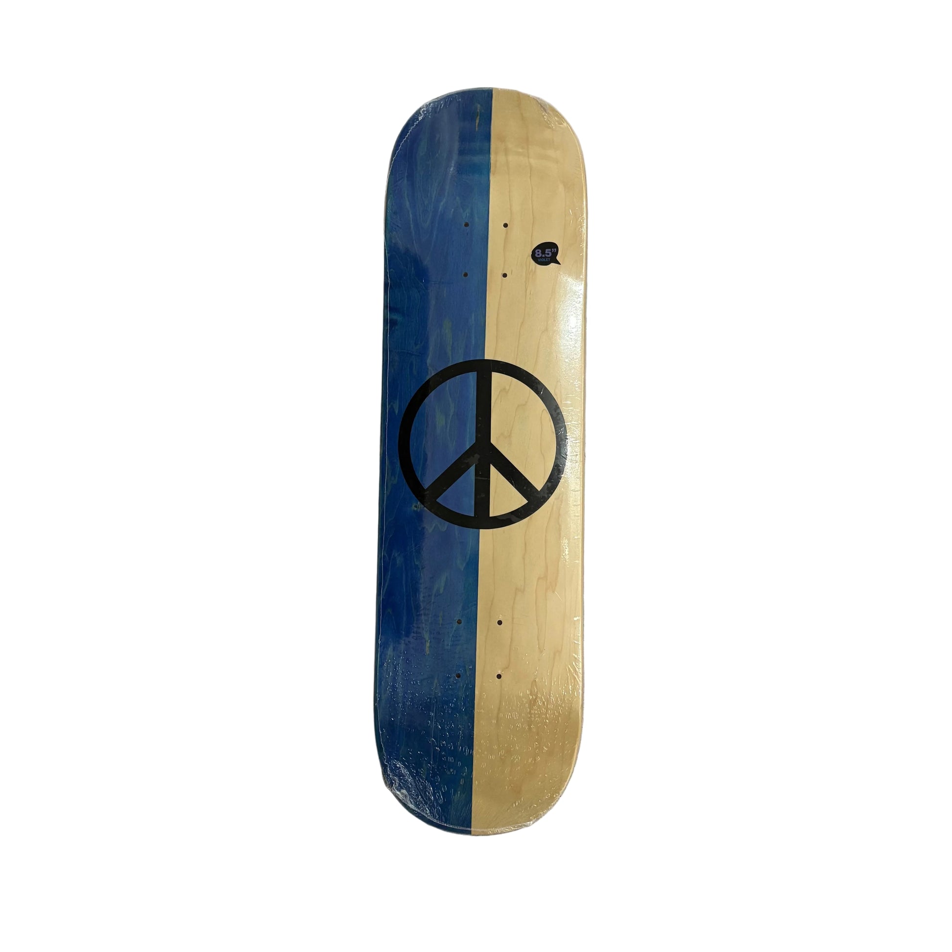 A skateboard deck with a vertical blue and natural wood split design, featuring a black peace sign graphic in the center, displayed on a white surface.