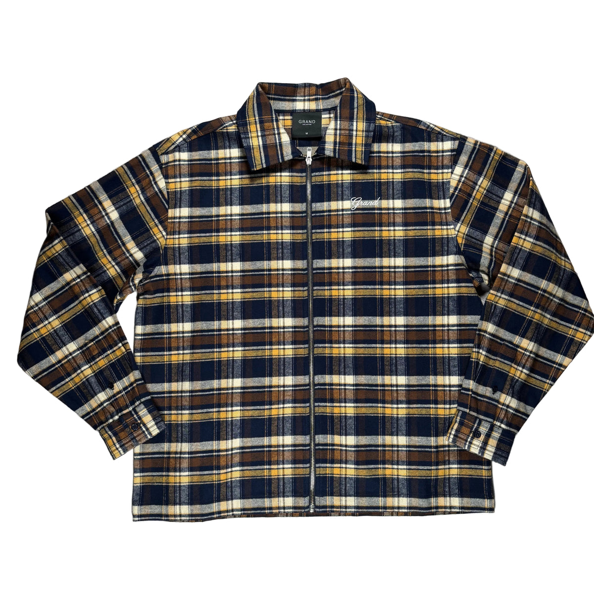 A zip-up plaid flannel shirt jacket in navy, mustard yellow, brown, and cream, laid flat on a white background.