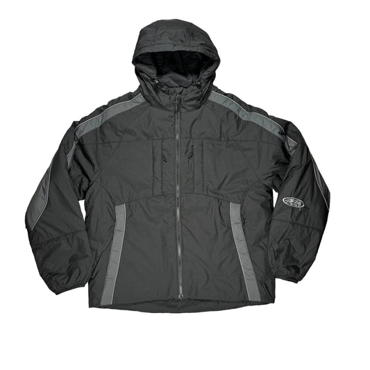 A black hooded, zip up jacket with gray shoulder and side panel accents, laid flat on a white surface.