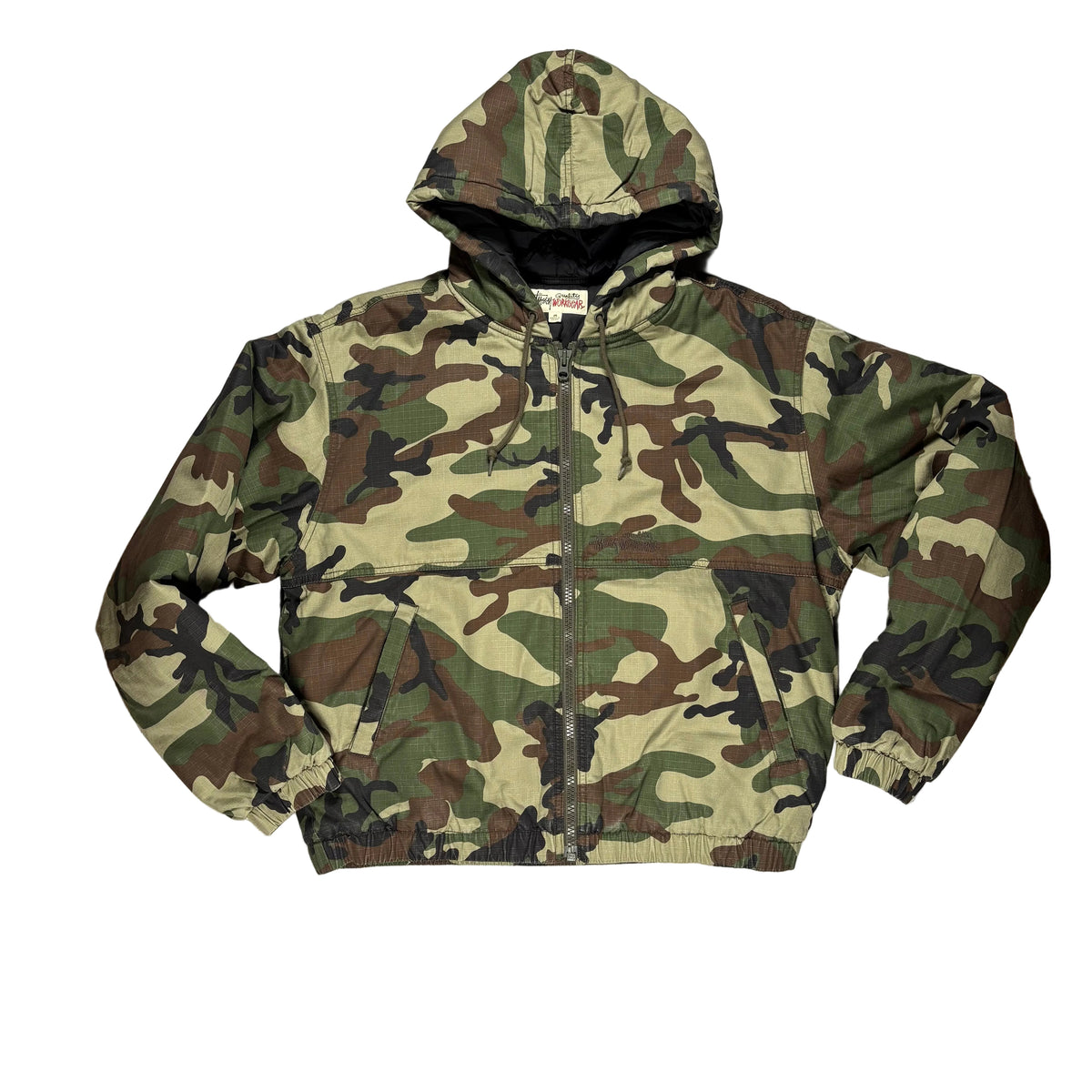 A camouflage hooded jacket with zipper closure, laid flat on a white surface.