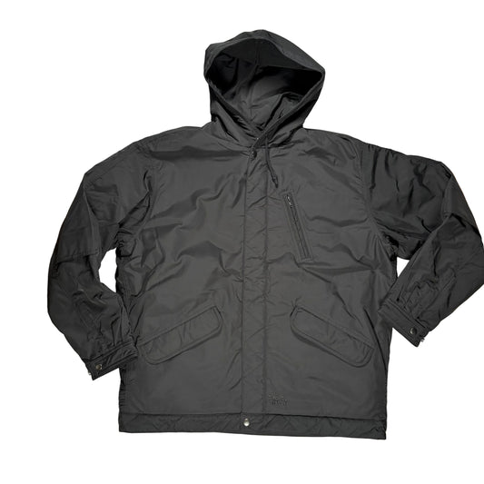 A black hooded jacket laid flat on a white surface. The jacket has a front zipper, a vertical zip chest pocket, and two large front flap pockets.