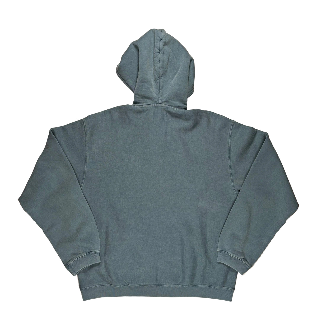A washed navy hooded sweatshirt shown from the back, laid flat on a white surface.