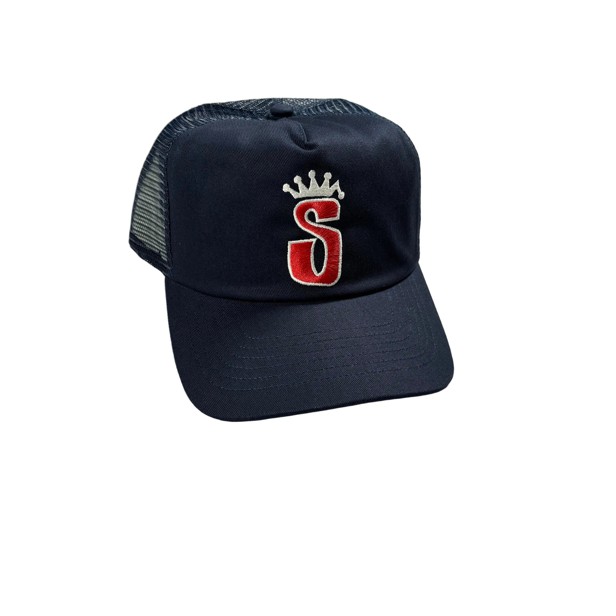 A navy blue trucker hat with a red embroidered letter 'S' and a small white crown on the front, resting on a light white surface.