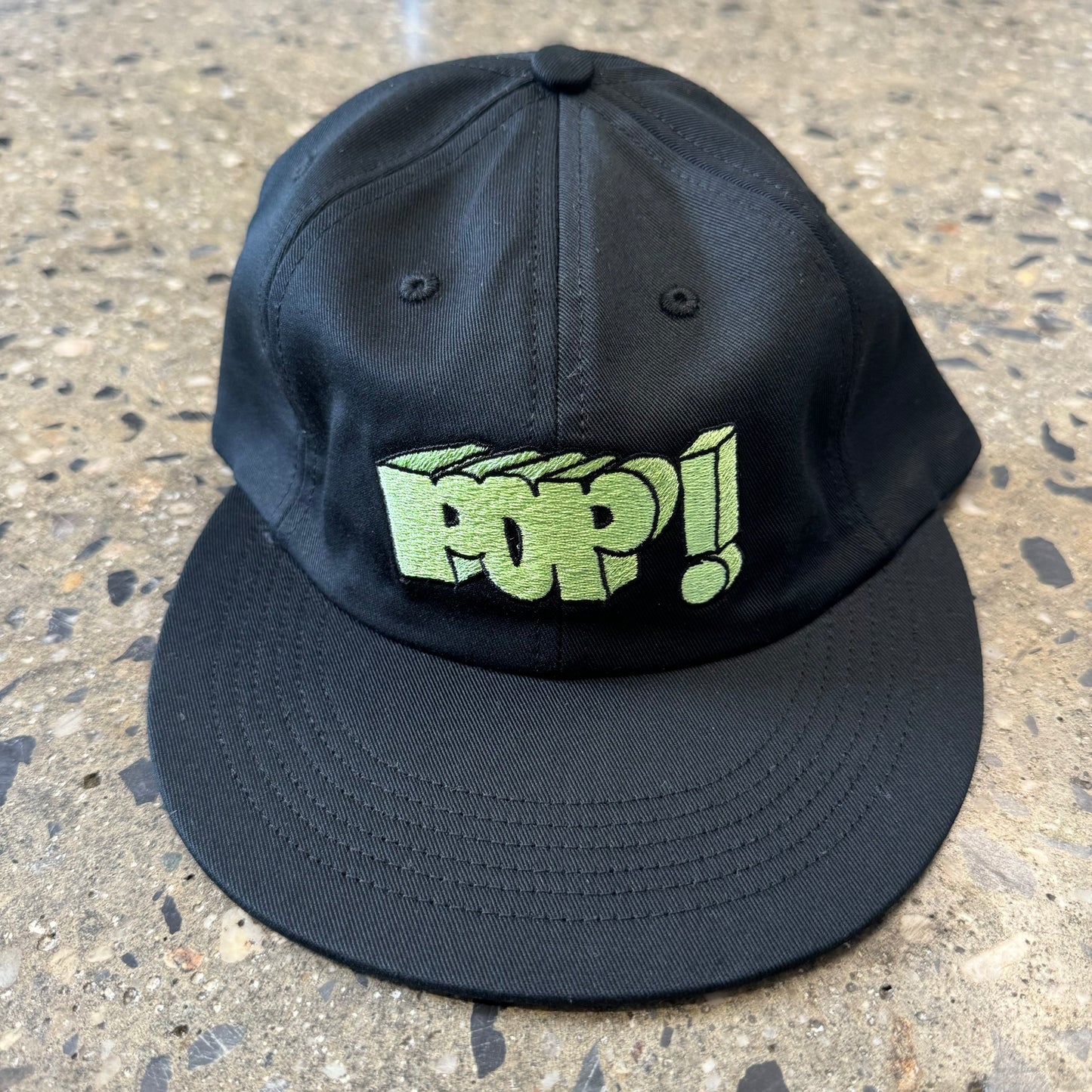 black hat with lime green text