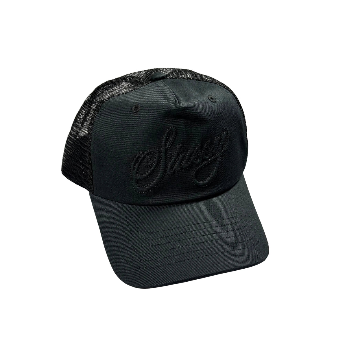 A black trucker cap with a black mesh back and an embroidered black script logo on the front, resting on a white background