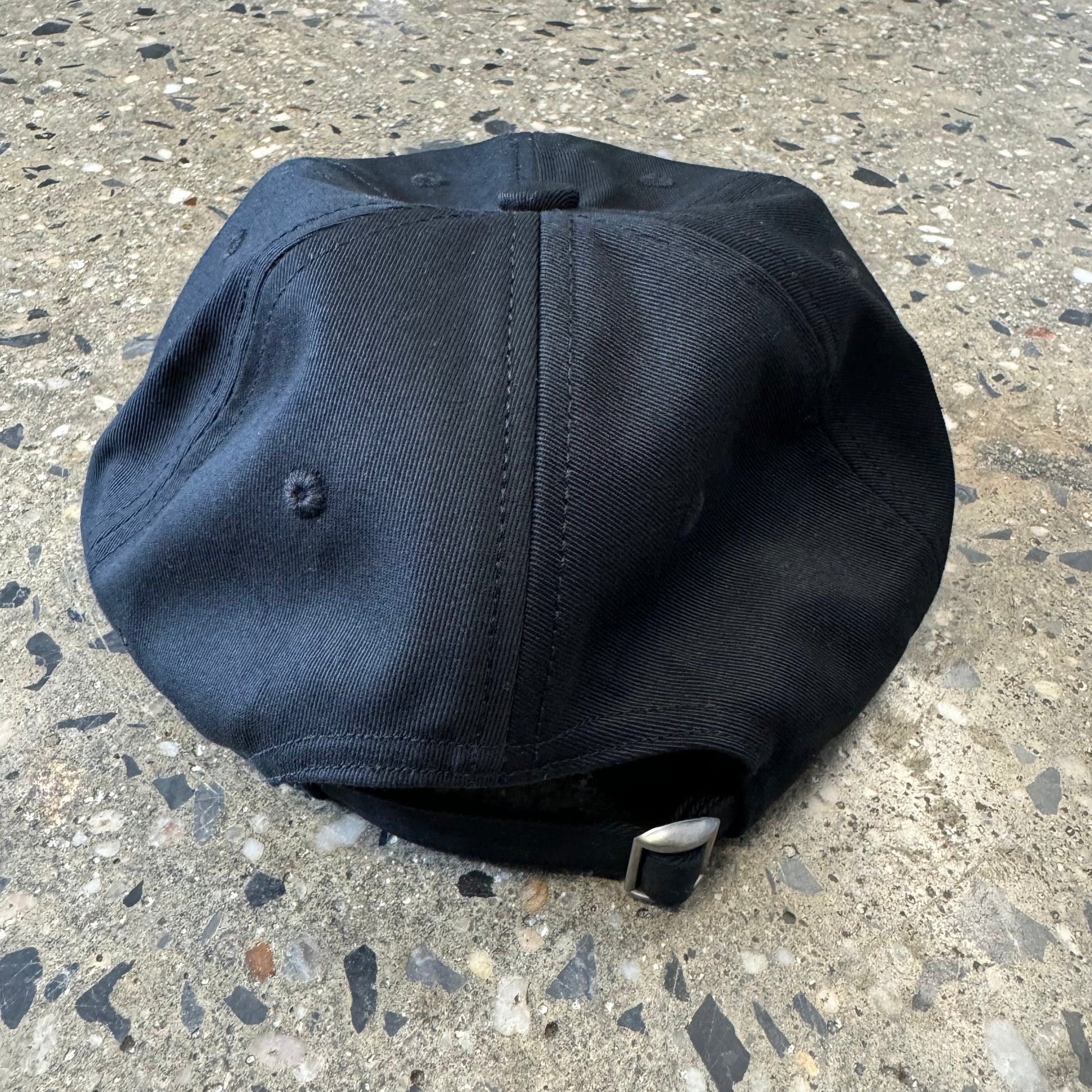 back of the hat. black twill strap