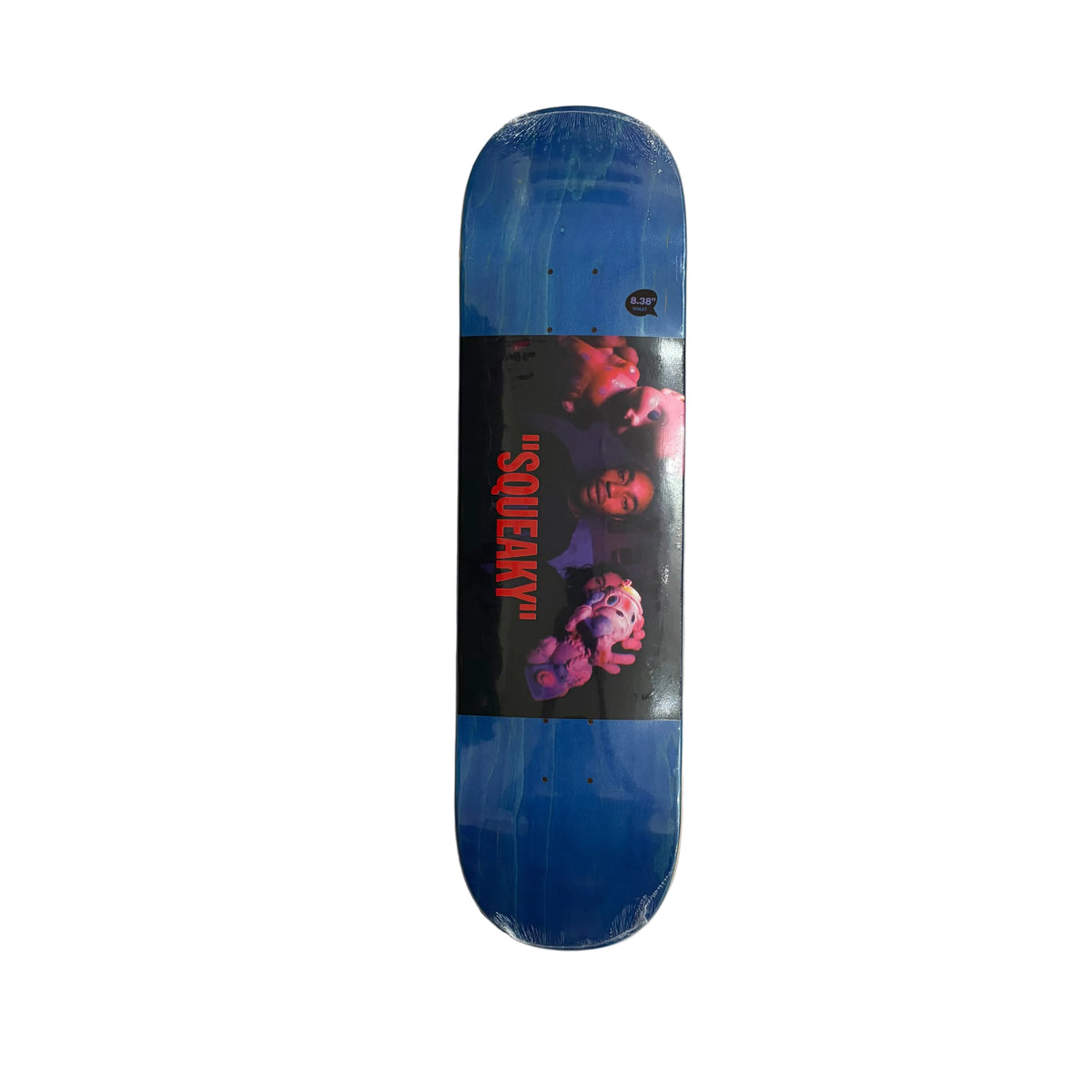 A skateboard deck with a blue gradient background and a central graphic print featuring the text ' Squeaky' in red text over a black photo panel, photographed flat on a white surface.