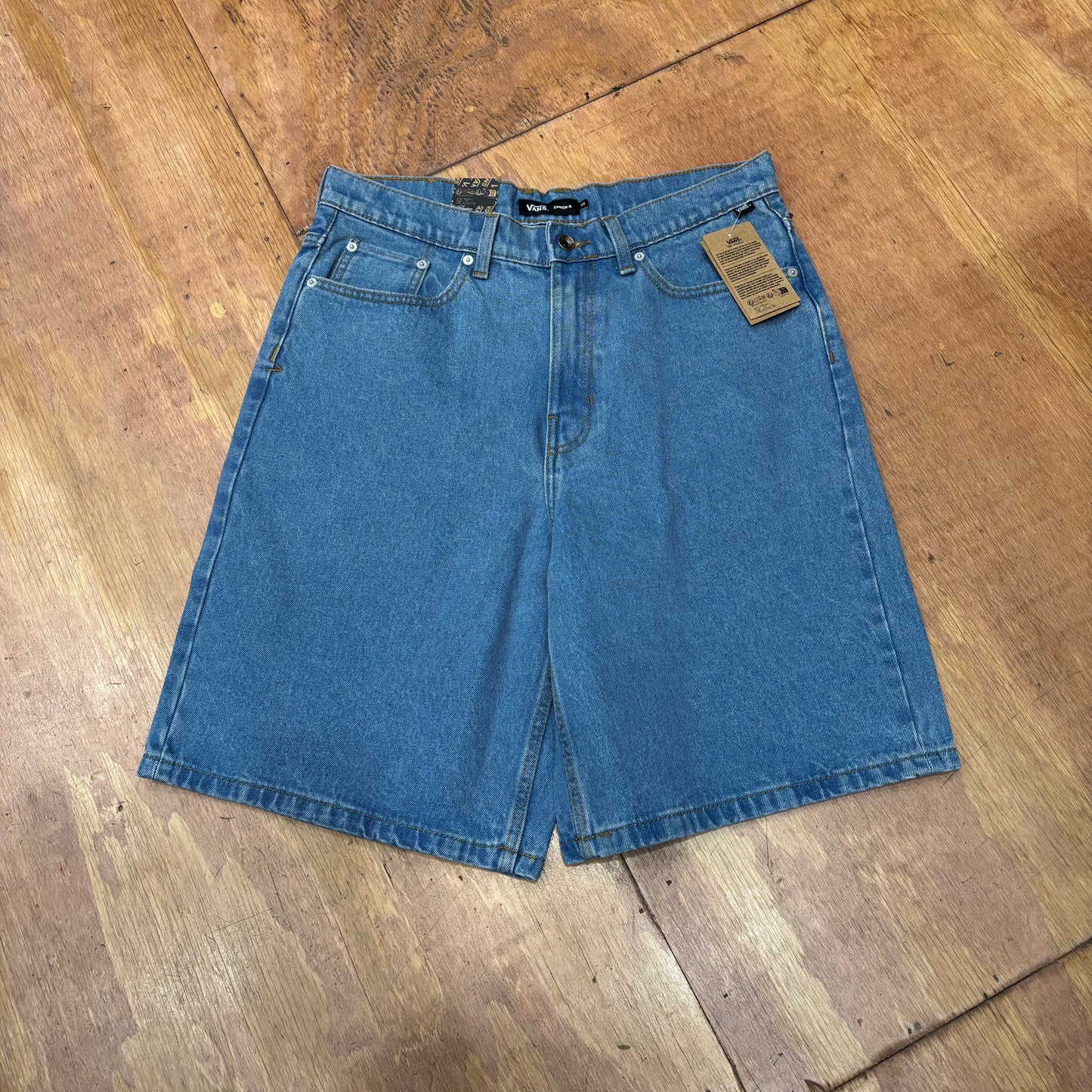 Front view of light blue baggy denim shorts