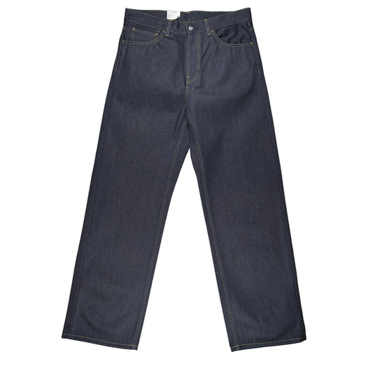 Dark indigo denim jeans laid flat on a white surface.