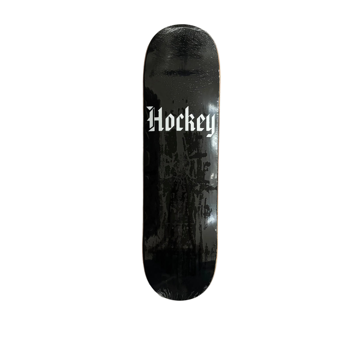 A black hockey skate deck with a white Gothic-style 'Hockey' logo, shown white surface.