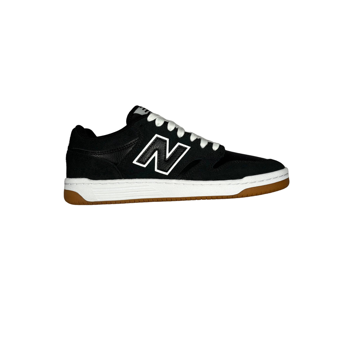 A single blackNew Balance sneaker, featuring a prominent white 'N' logo on the side, white laces, a white midsole, and a brown gum outsole, shown from a side profile against a white background.