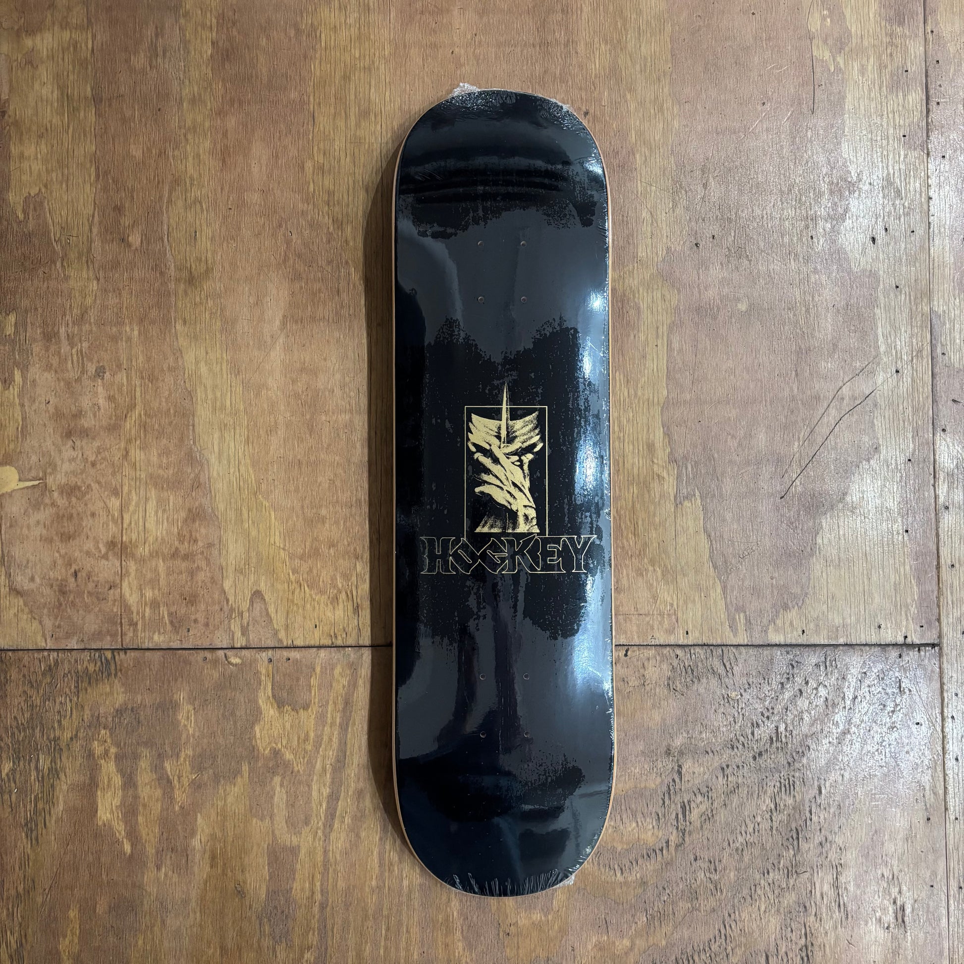 abstract face in middle of deck with HOCKEY written below