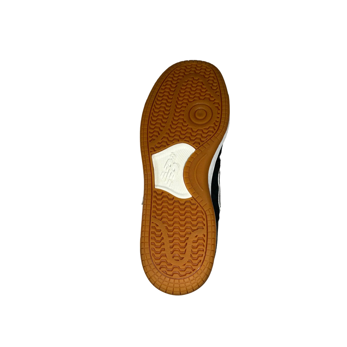 Photo of a gum sneaker sole displayed on a white surface.