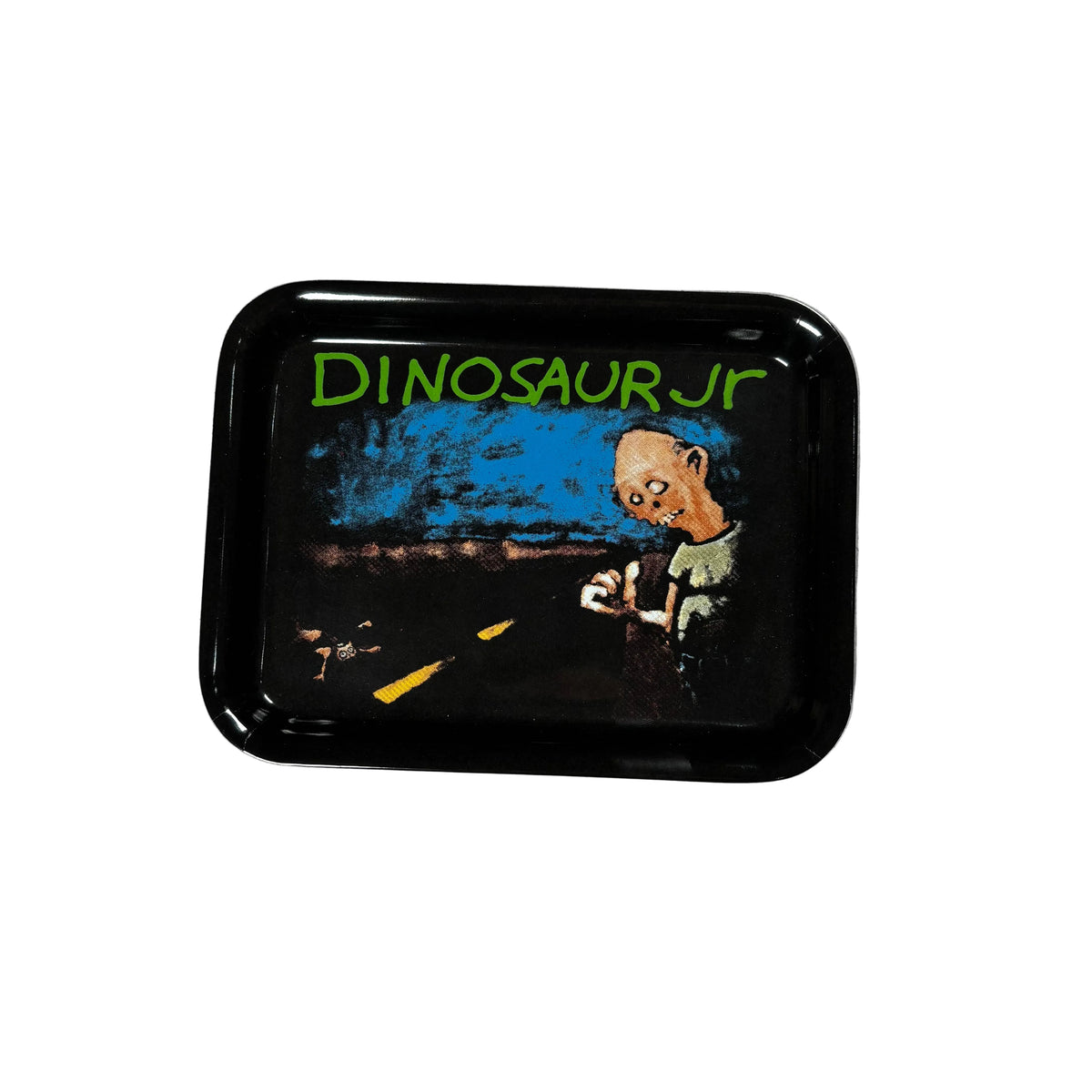 A black rectangular metal rolling tray with rounded corners, featuring a colorful graphic of a person holding a small dinosaur under the text 'DINOSAUR JR' in green, placed on a white surface.