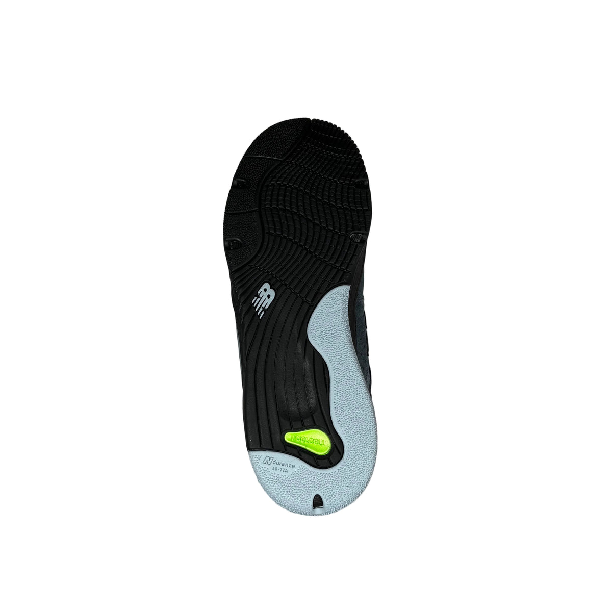 The outsole of a New Balance shoe shown from a top-down view, featuring a black textured tread, a light gray heel counter, and a bright neon green logo on the heel, set against white background