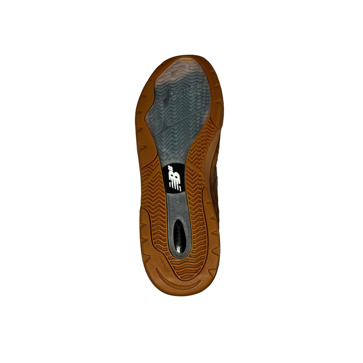 A single sneaker sole viewed from above, featuring a brown gum outsole, a gray textured tread, and a black heel section with a white logo, set against a white background.
