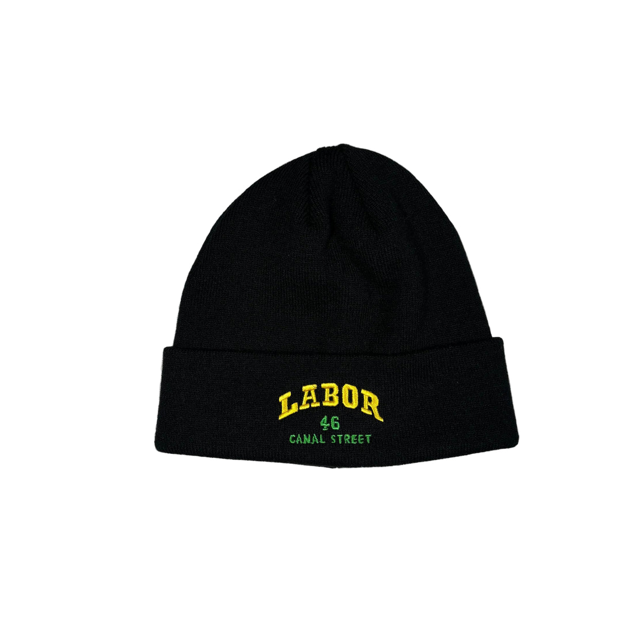 A black knit beanie hat with a folded cuff, featuring yellow and green embroidered text reading 'LABOR 46 CANAL STREET' on a white background