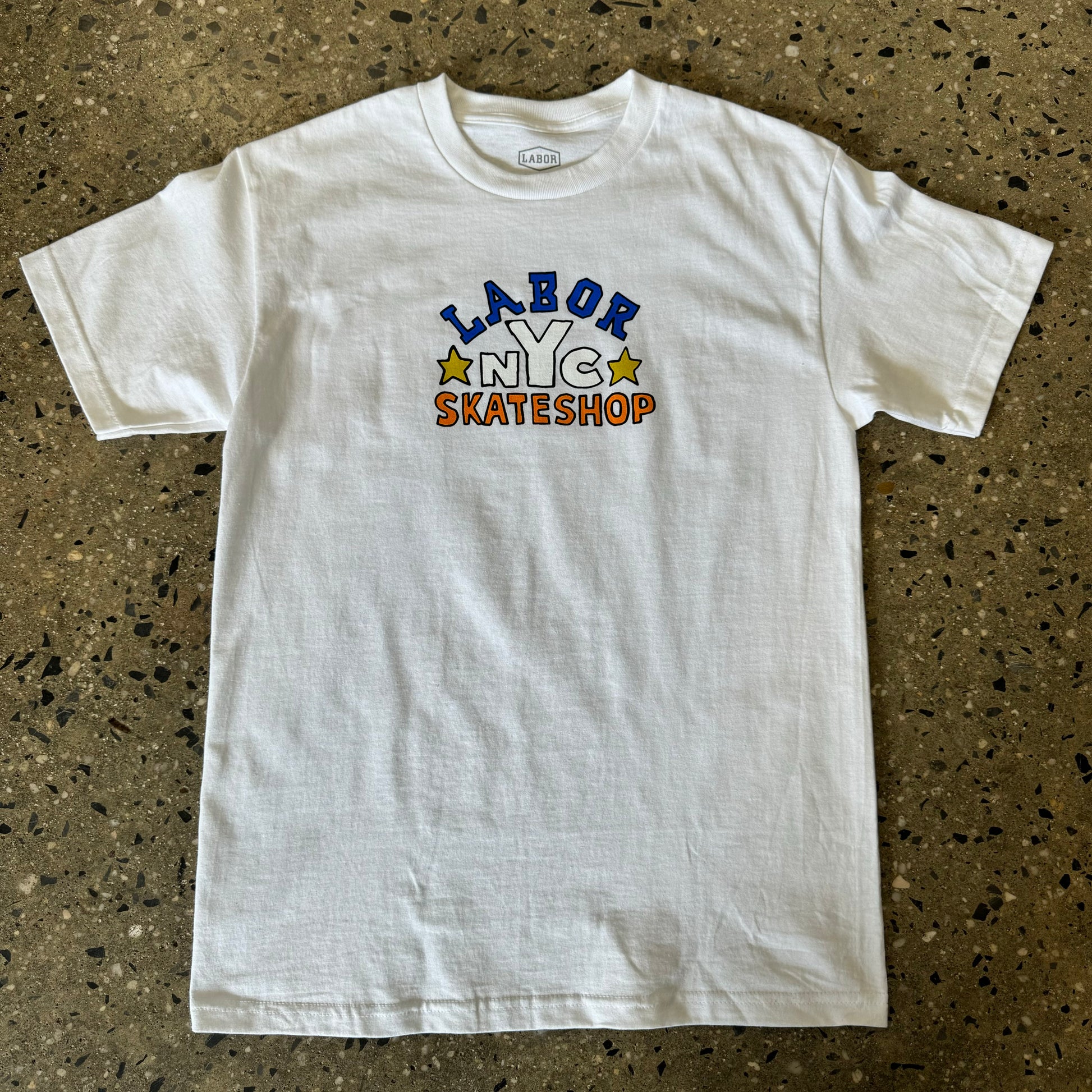 white t shirt with centered royal blue, orange and white text  