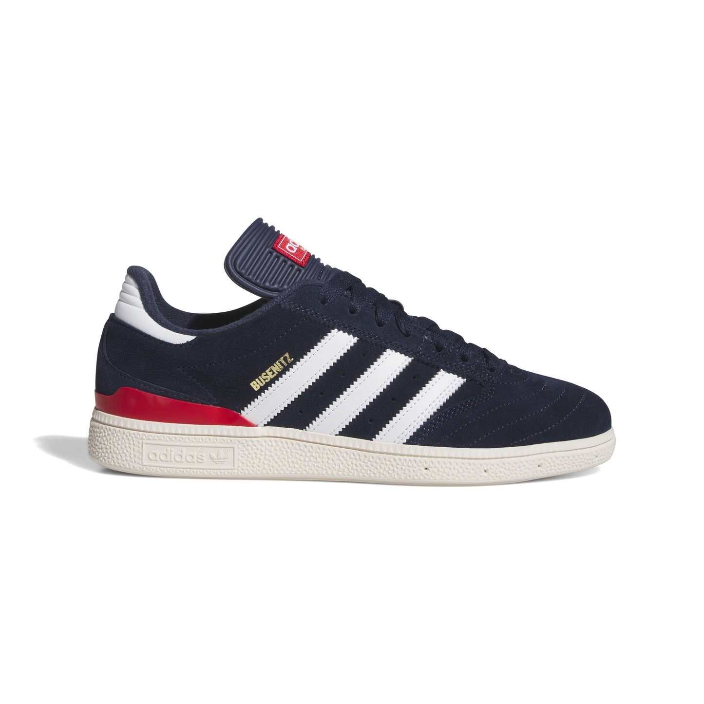 Side view of navy, white suede lowtop soccer style shoe with red accent on heel