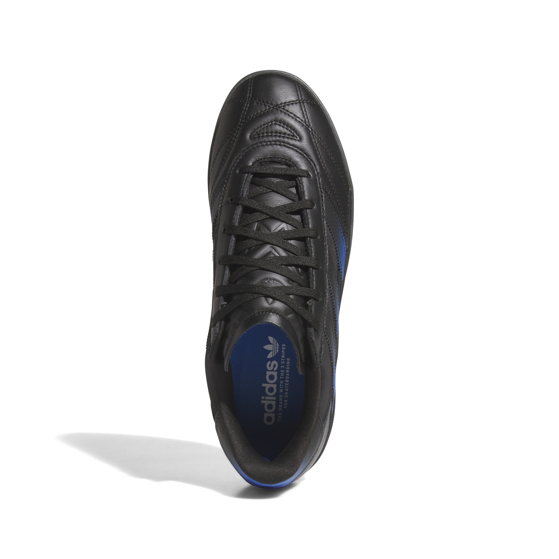 Black Adidas skateboard shoe on a white background