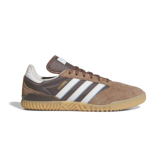 Brown and beige sneaker with white stripes on a white background