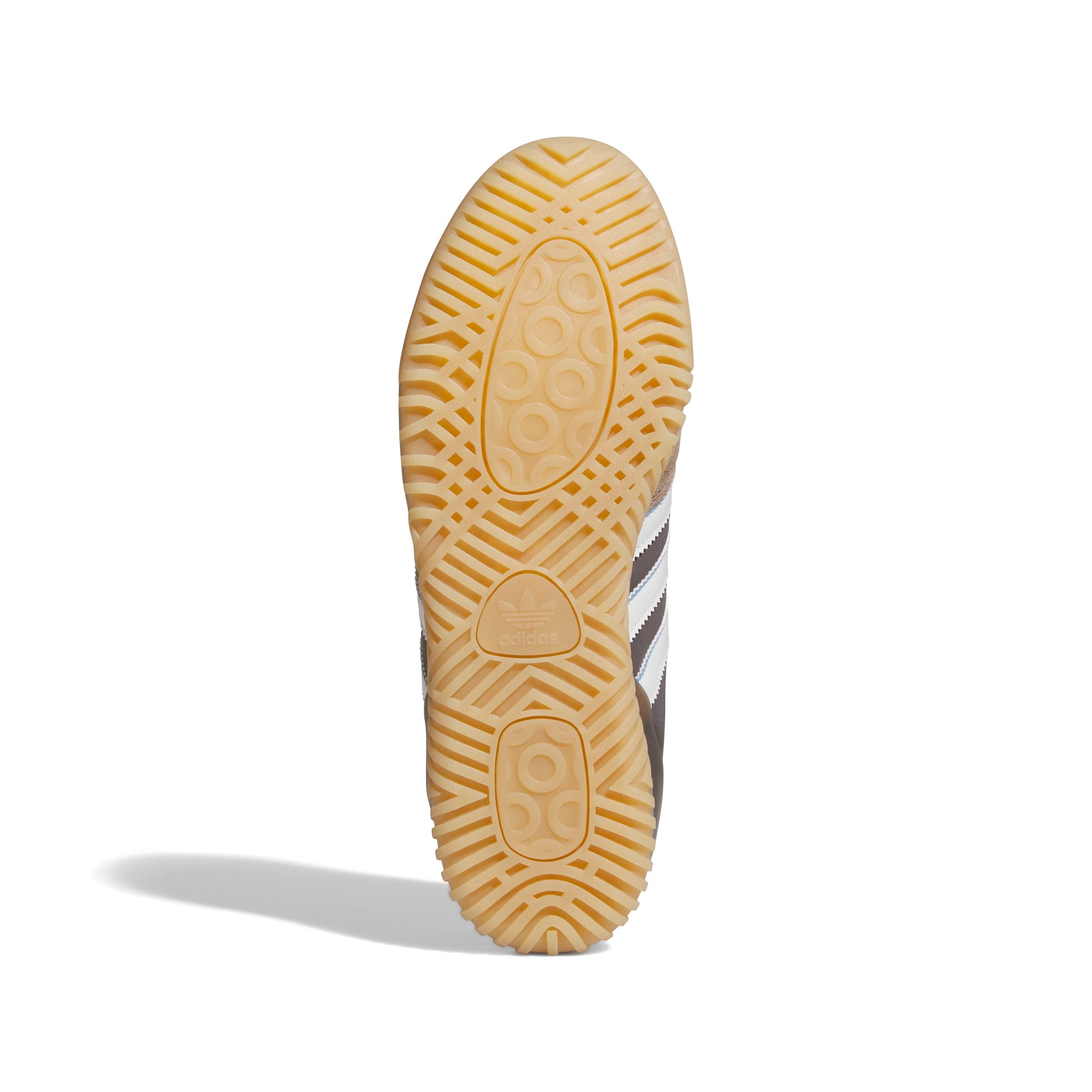 Close-up of a shoe sole with a brand logo on a white background