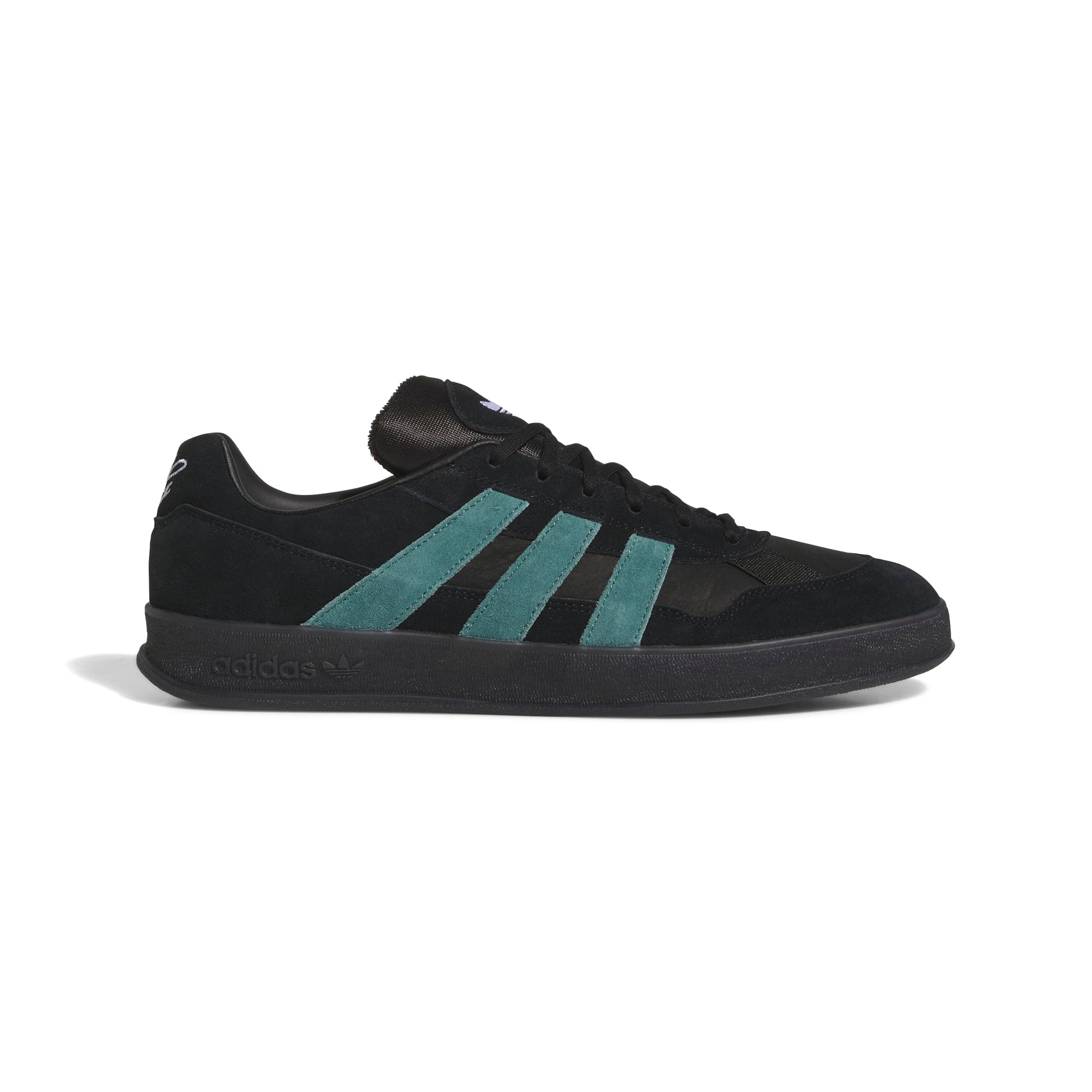 Black Adidas sneaker with teal stripes on a white background