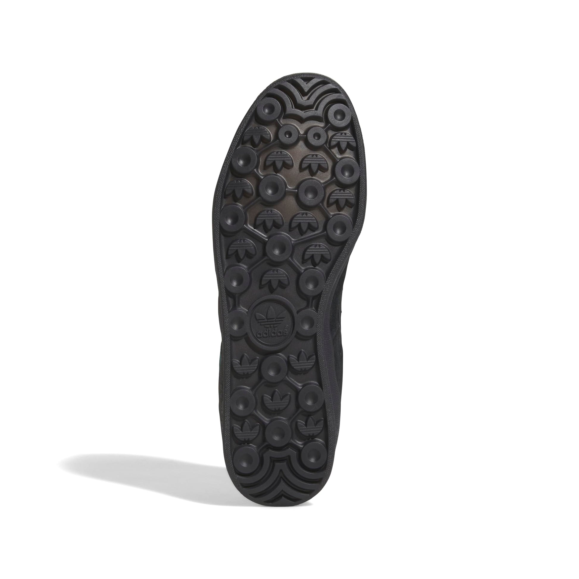 Black sole of a shoe with tread pattern on a white background