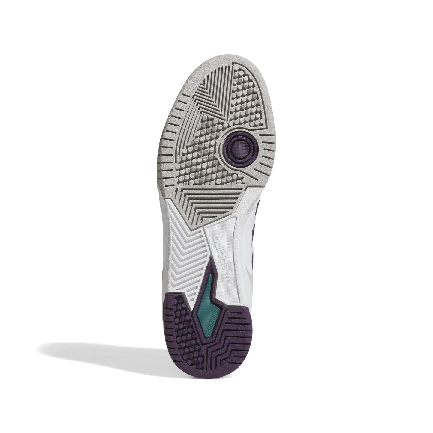 Close-up of a shoe sole with tread pattern on a white background
