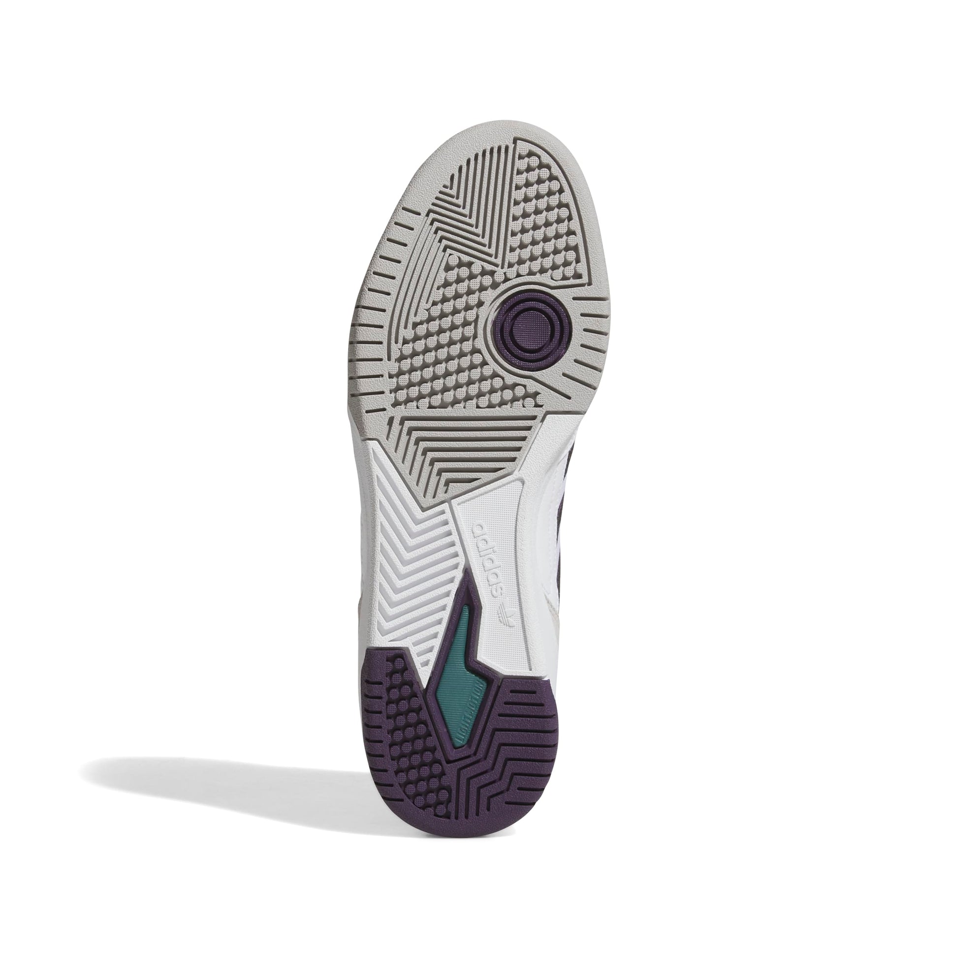 Close-up of a shoe sole with tread pattern on a white background