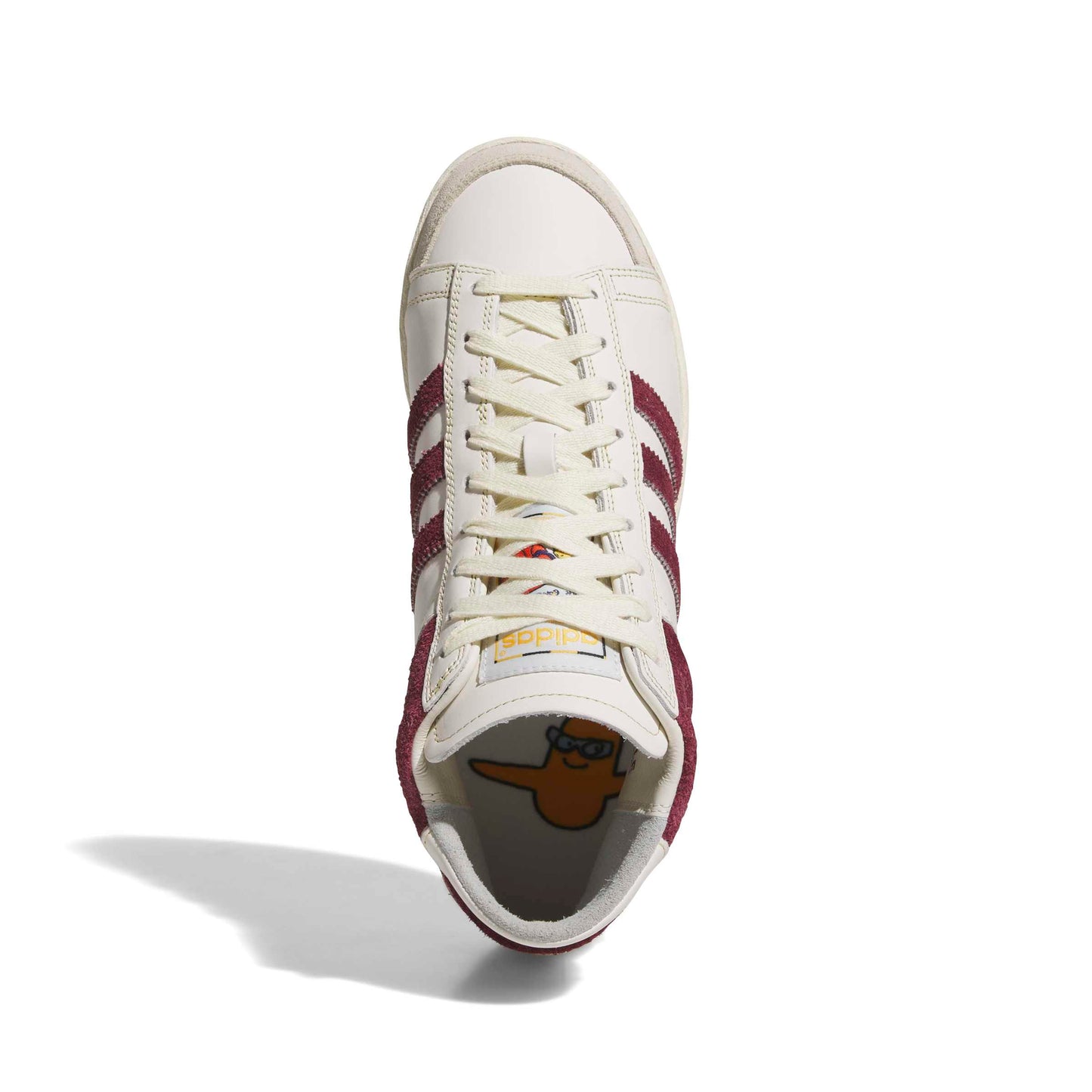 White sneaker with maroon stripes on a white background