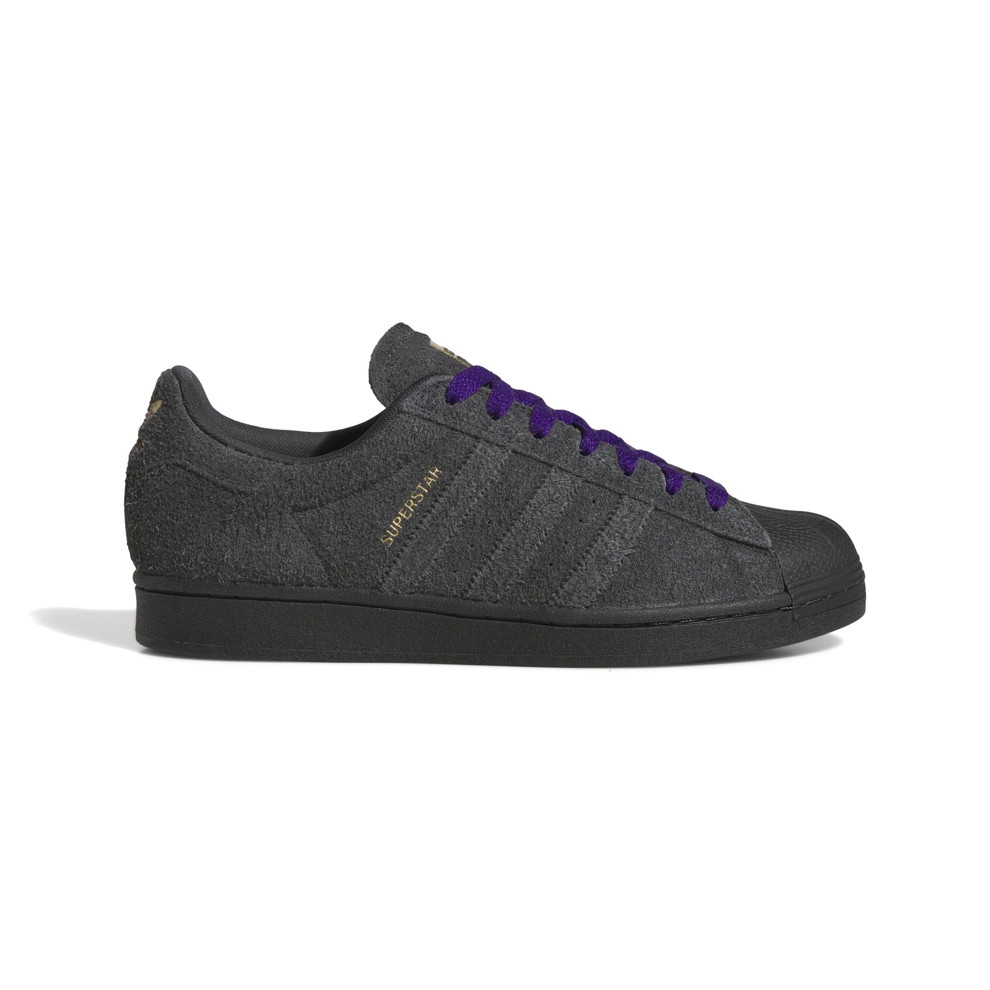 Gray Adidas sneaker with purple laces on a white background