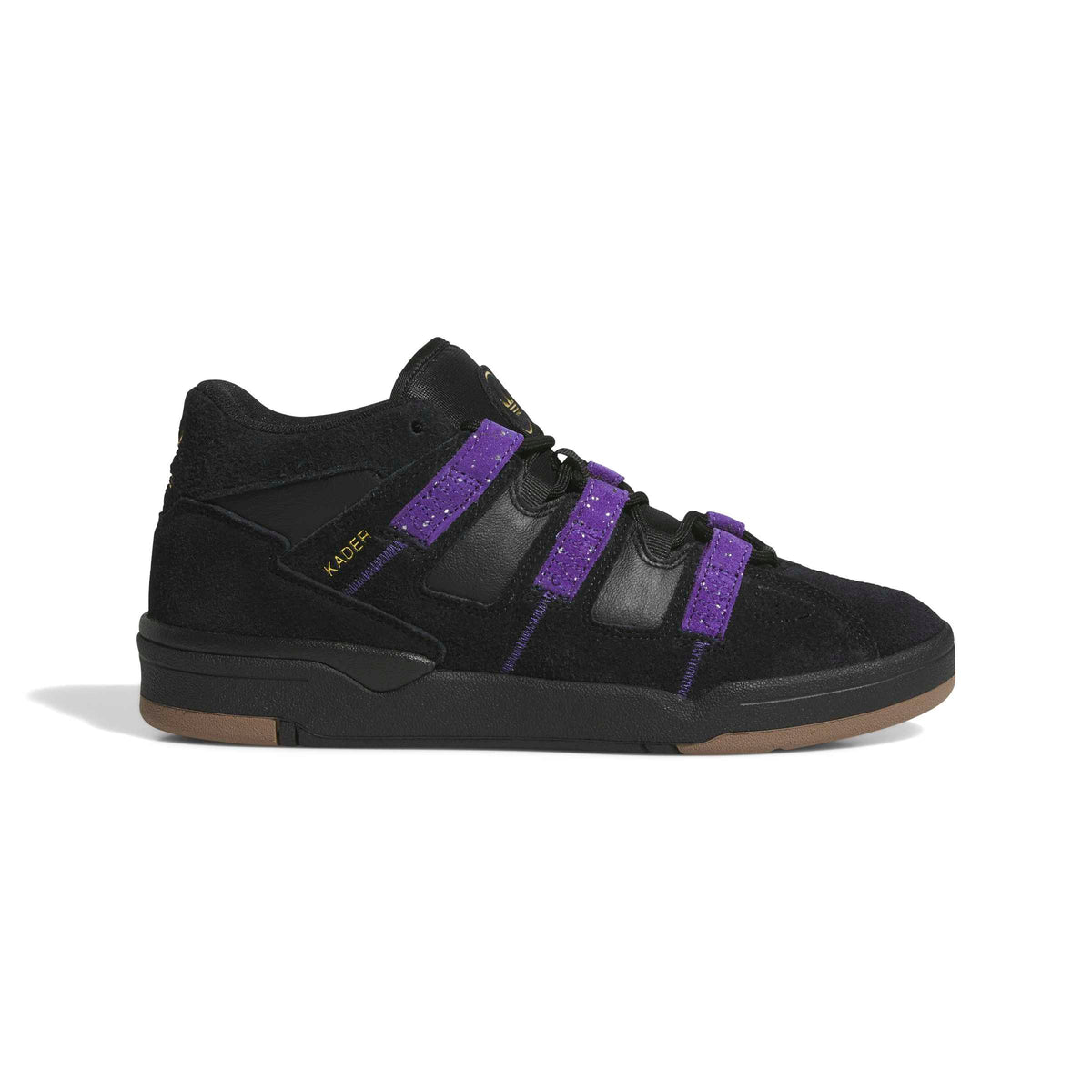 A black mid-top skate shoe with three wide purple glittery straps across the side, gold 'KADER' branding on the heel, and a gum brown outsole, shown against a plain white background.