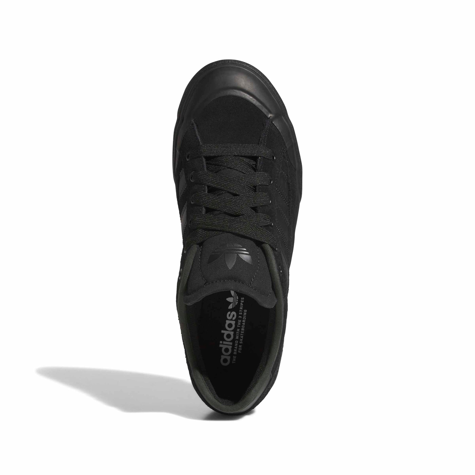 top down view of Black Adidas sneaker on a white background