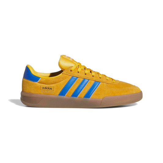 Yellow Adidas sneaker with blue stripes on a white background